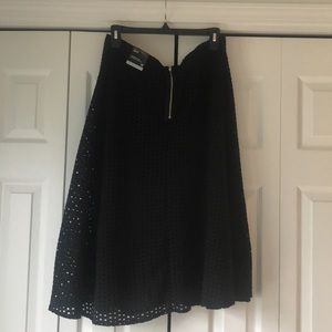 Brand new.Black eyelet overlay summer skirt